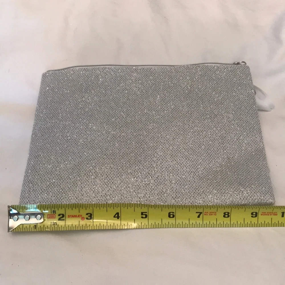 NWOT Orlane Paris silver sparkly cosmetic pouch